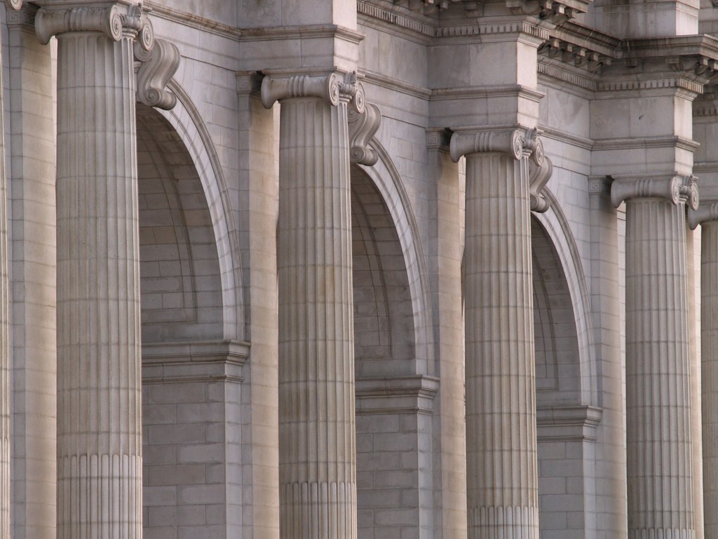 Stone columns and arches inside a public hall